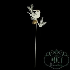 Fém karácsonyi dísz; formájának kitűnően alkalmazkodik a lakás stílusához.