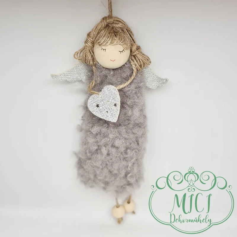 az asztal; vagy a karácsonyfa mellett egyaránt dekorálható.