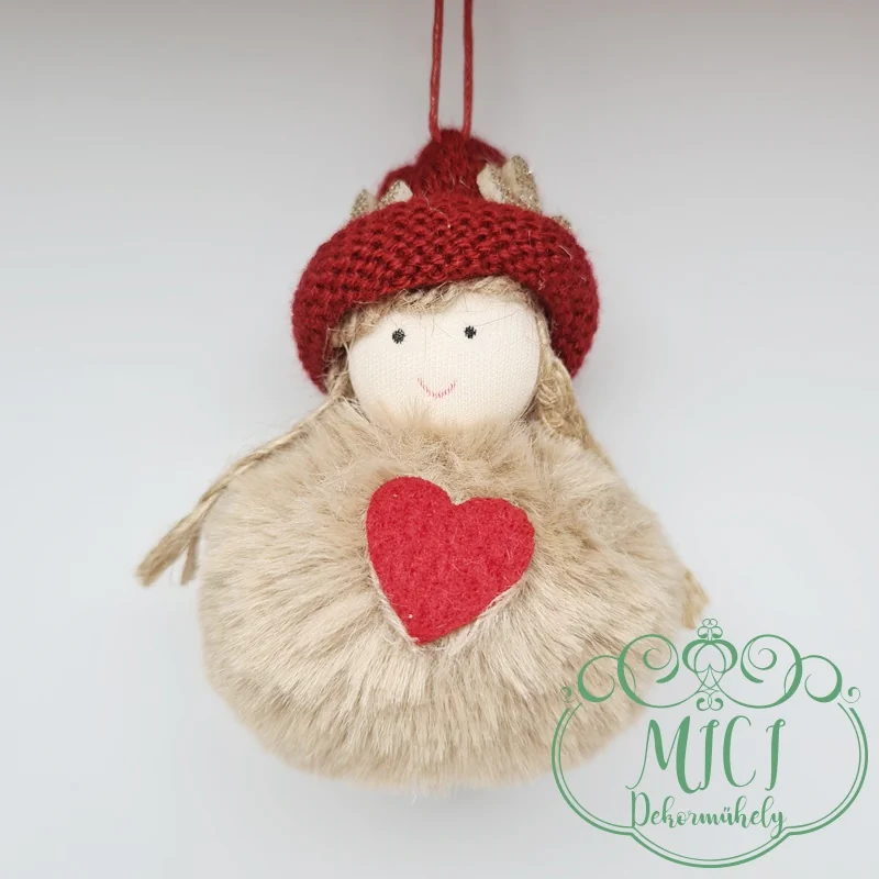 az asztal; vagy a karácsonyfa mellett egyaránt dekorálható.