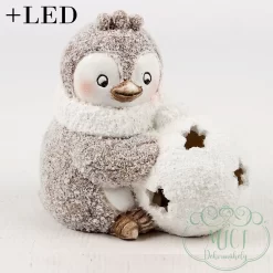 Karácsonyi LED-es dekoráció. Pingvin LED-es hogolyóval-áttört csillagokkal