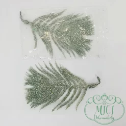 Csillogó dekorációs alapanyag; levél 9cm hosszú; 6-7cm széles. Kiegészítője lehet: karácsonyi